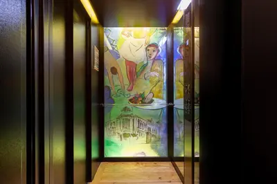 a hallway with a painting on the wall at YOUROPO - Bolhao in Porto