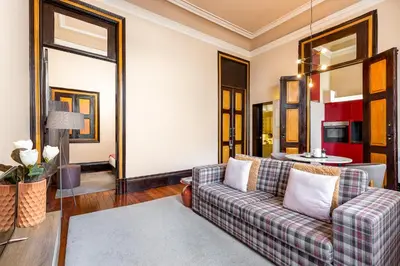 a living room with a couch and a table at YOUROPO - Bolhao in Porto