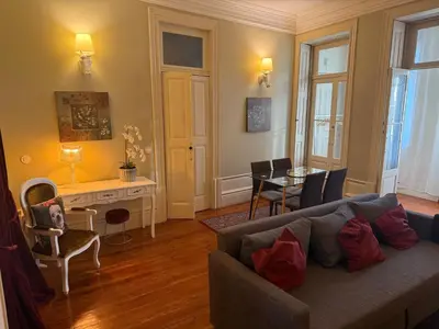 a living room with a couch and a table at ML Apartments Story in Porto