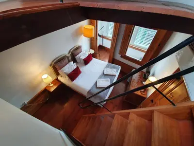 an overhead view of a living room with a couch at Porto Alegria Garden in Porto