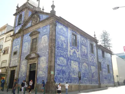 an old building with blue tiles on the side of it at Dukes Corner Guest House in Porto