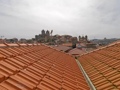 an overhead view of roofs of a city at FLH Porto Modern Rooftop in Porto