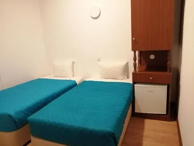 two beds sitting next to each other in a room at Residencia Vale Formoso in Porto