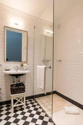 a bathroom with a sink and a shower at bnapartments Carregal in Porto