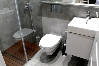 a bathroom with a toilet and a sink and a shower at Casa da Catedral in Porto