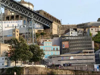 a view of a city with a bridge and buildings at GuestReady - Eiffel Waterfront apartments in Porto