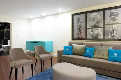 a bedroom with a large white bed and a window at Porto Old Town – Tourism Apartments in Porto