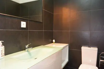 a bathroom with a sink and a toilet at Júlio Dinis Flat, by Flat in Porto in Porto
