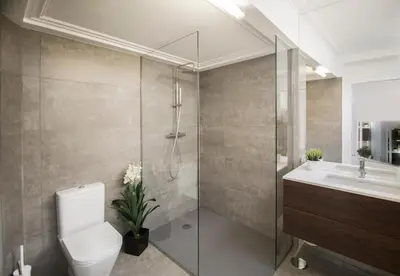 a bathroom with a shower and a toilet and a sink at the5rooms.porto in Porto