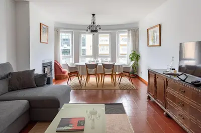 a living room with a couch and a table at Avenida Apartment by MP in Vila Nova de Gaia