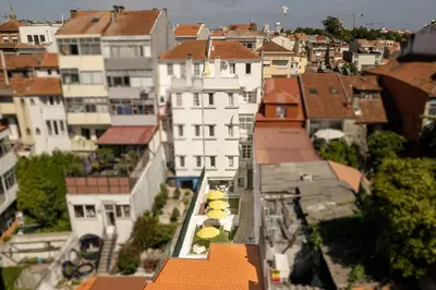 a model of a building with umbrellas on it at Antero Quental Residence in Porto