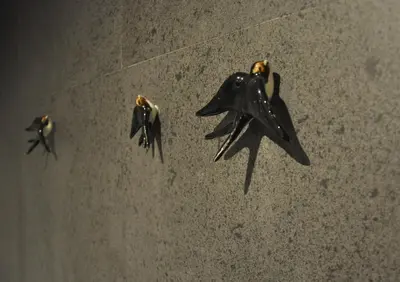 three small planes sitting on a table at PicPorto Apartment in Porto