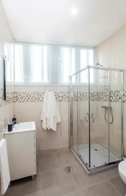 a bathroom with a shower and a sink at LL Picaria 16 in Porto