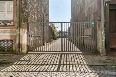 an empty parking lot in front of a building at Studio 312 - With Free Parking in Porto