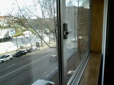 a view of a city street from a window at Metro-Apartment RNAL nº35375 AL-Chamada para a rede móvel nacional in Porto