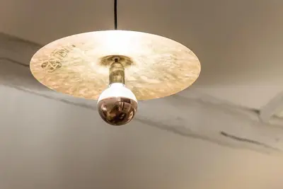 a ceiling light hanging from a ceiling at GuestReady - Mezzanine at the Bridge in Porto