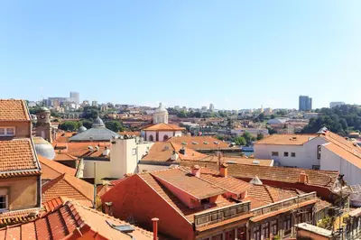 an aerial view of a city with red roofs at Chateau Belomonte in Porto