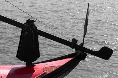 a person in a robe is standing on a boat at Welcome to My City 