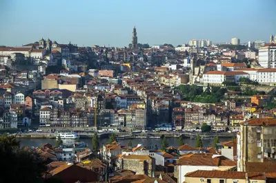 a view of a city with a river and buildings at Welcome to My City 
