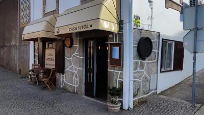 a building with a sign on the side of it at O'Porto Cheers Gaia in Vila Nova de Gaia