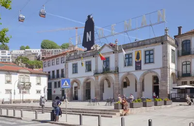 a group of people standing in front of a building at O'Porto Cheers Gaia in Vila Nova de Gaia