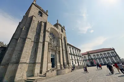 a group of people walking in front of a building at FLH Porto Comfort Flat in Porto