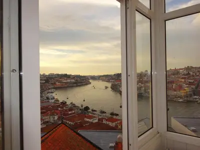 a view of a river from a window at Bom dia Porto in Vila Nova de Gaia