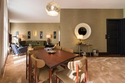 a dining room with a table and chairs at Deco Gem Aliados in Porto