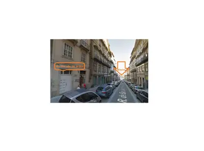 a view of a city street with cars parked at Merc Porto Ribeira's View in Porto