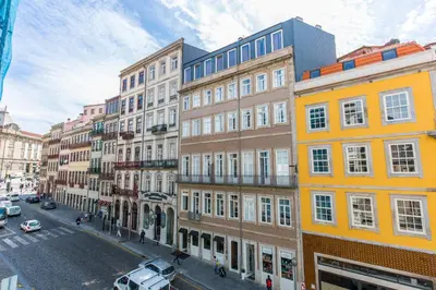 a group of buildings on a city street at Downtown Porto Mouzinho Studio Apts in Porto