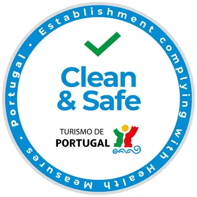 a blue clean and safe logo at Covelo Apartment in Porto