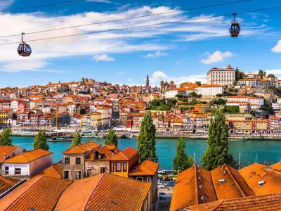 a view of a city with a river and buildings at Oporto Bernardes Studios - Heroísmo in Porto