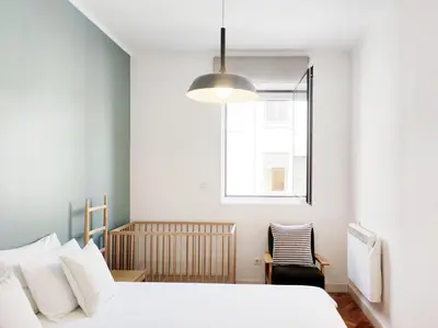a bedroom with a bed and a window at E36 - ideal for families - large areas in Porto