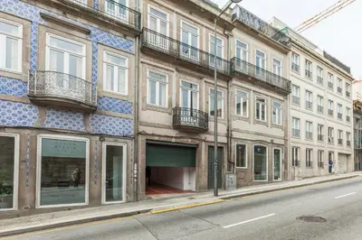 a building on the side of a city street at Go2oporto - Fontainhas Apartments in Porto