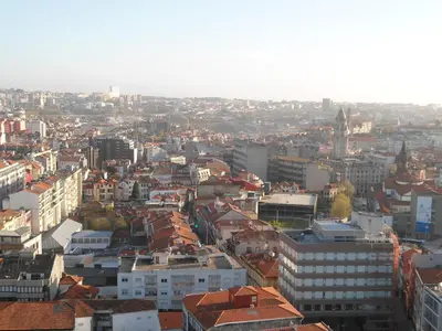 an aerial view of a city with buildings at BEST - Trindade Tower in Porto