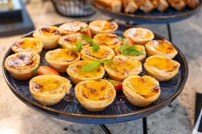 a plate of food on a table at Hotel Cristal Porto in Porto