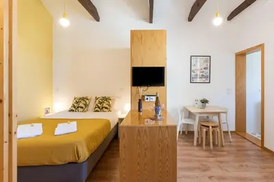 a model of a house with a large window at 731 Costa Cabral Metro Residence in Porto