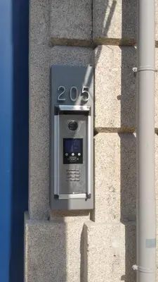 a parking meter on the side of a building at Wood Loft by RDC in Porto