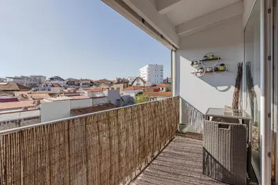 a balcony with a view of a city at Oporto LightHouse Apartment by DA'HOME in Porto
