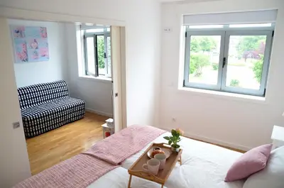a bedroom with a bed and a window at Porto Smart Apartments - Downtown in Porto