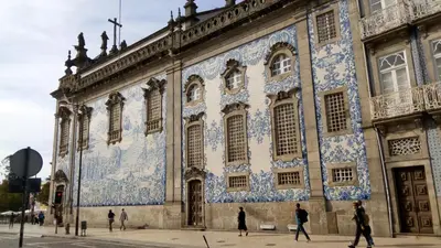 a large building with blue and white tiles on it at VRS - Porto Centre Trindade Studio in Porto