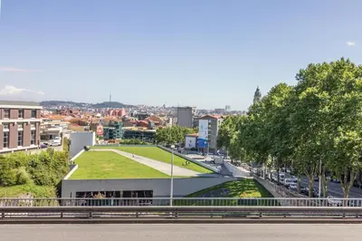 a view of a building with a grass roof at Green Suite in Porto