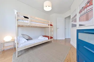 a bedroom with two bunk beds in a room at Sleep in Centre in Porto