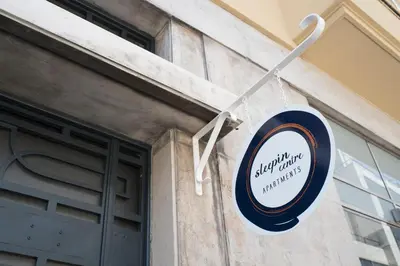 a sign on the side of a building at Sleep in Centre in Porto