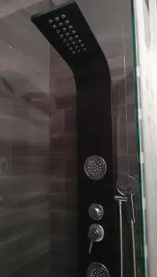 a shower with two faucets and a shower at Porto Downtown Main Str (S.Catarina) + Free Park in Porto