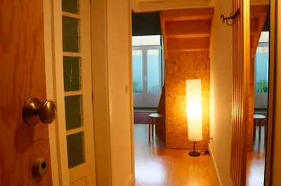 a kitchen and dining room with a table and chairs at DL 205 in Porto