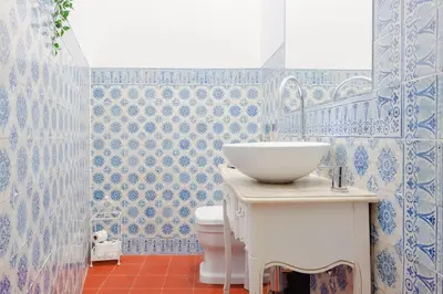 a bathroom with a sink and a toilet at Get a Unique and Luxury Flat in Porto