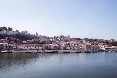 a view of a city with a body of water at Panorama Apartments Ribeira Porto in Porto