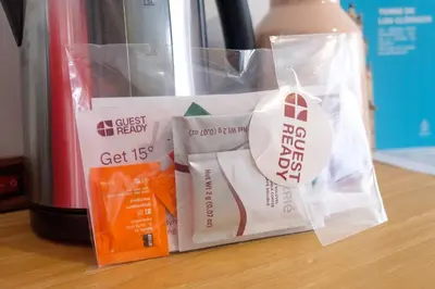 a bag of food sitting on a table next to a bottle at GuestReady - Back to Little World in Porto