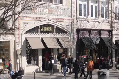a group of people walking in front of a store at Oporto Centre Clean & Cozy Apt 1 in Porto